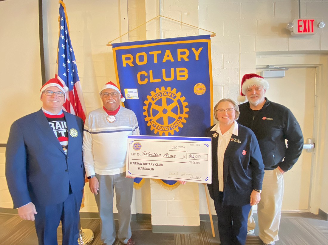 Pictured (L to R) are Alan Alderfer; William Smith, Rotary president; Envoy Sina Locke and Envoy Ken Locke, Salvation Army administrators. Photo Provided