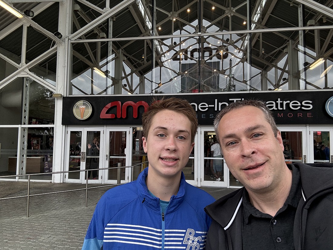 Pictured are Warsaw Community Schools Superintendent Dr. David Hoffert and his son, Ryun, attending the premiere of "The Boys in the Boat." Photo Provided.