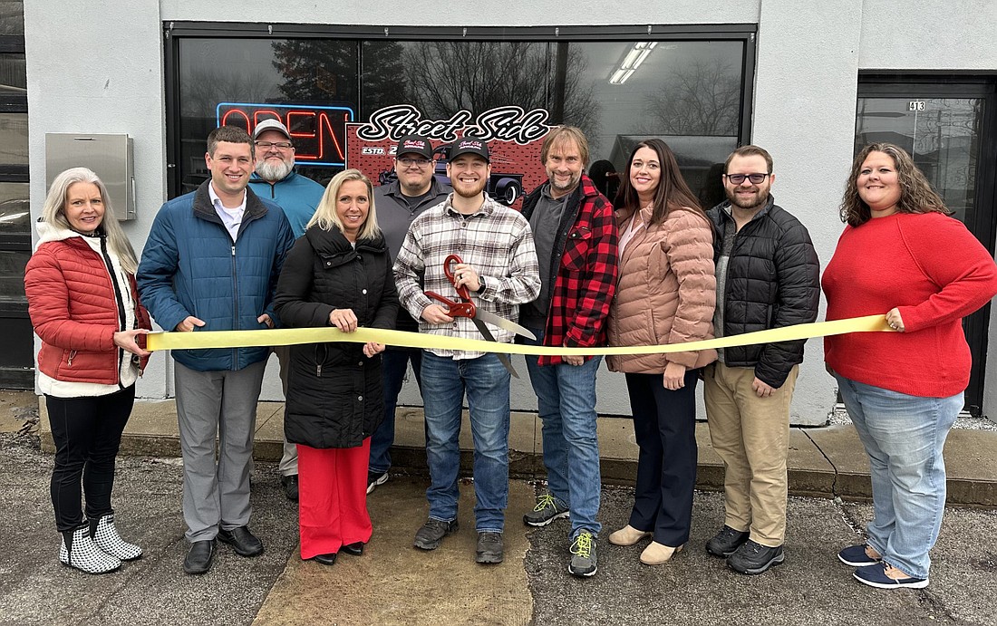 The North Webster-Tippecanoe Township Chamber of Commerce held a ribbon-cutting ceremony at noon Wednesday for Street Side Detailing, 413 N. Main St., North Webster. Pictured (L to R) are, front row: Elise Guy, Tyler Huffer; Emily Shipley; Trent Rapp, owner of Street Side Detailing; Chris Trowbridge, Gwen Fuchs, Josh Himelick, Nicole Nabinger; back row: Ryan Coverstone and Tyler Yates. Photo by David Slone, Times-Union