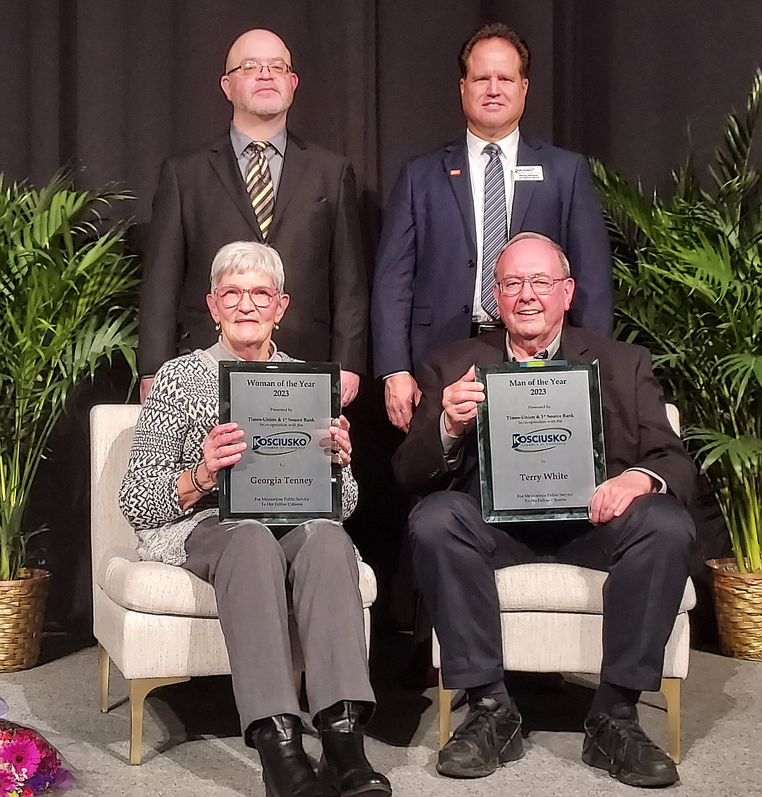 The 2023 Man and Woman of the Year Awards were presented to Dr. Terry White (seated, R) and Georgia Tenney (seated, L), respectively, during the Kosciusko Chamber of Commerce Annual Awards Dinner. The awards are co-sponsored by the Times-Union and 1st Source Bank and were presented by David Slone (standing, L), Times-Union. and Doug Hanes (standing, R), 1st Source Bank. Photo by Jackie Gorski, Times-Union