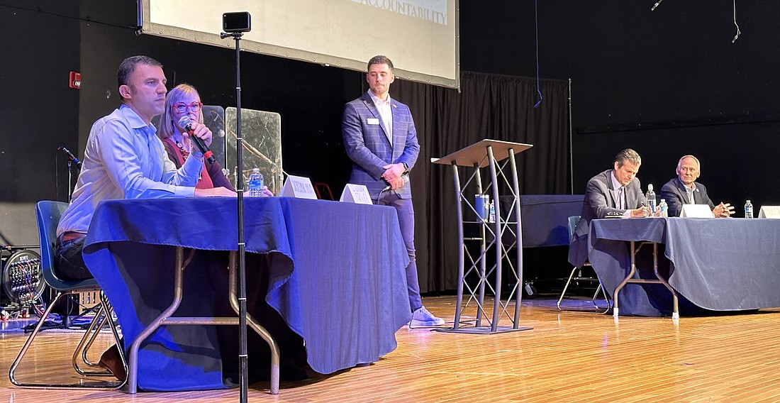 Elected officials participating in a school assembly Friday at Lakeland Christian Academy in Winona Lake (L to R), seated: U.S. Rep. Rudy Yakym, Indiana Lt. Gov. Suzanne Crouch, Indiana Sen. Ryan Mishler and Indiana Rep. Craig Snow. Standing in the center is LCA Campus Life Director Joe Jackson. Photo by David Slone, Times-Union