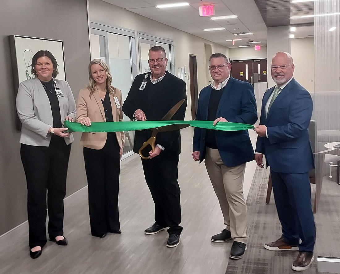 Pictured (L to R) are Megan Smith, COO of Parkview Packnett Family Cancer Institute; Ashley Wirges, vice president of patient care services at Parkview Kosciusko Hospital; Jeff Rockett, vice president of operations; Scott Gabriel, market president; and Dr. Greg Johnson, regional market president. Photo by Jackie Gorski, Times-Union