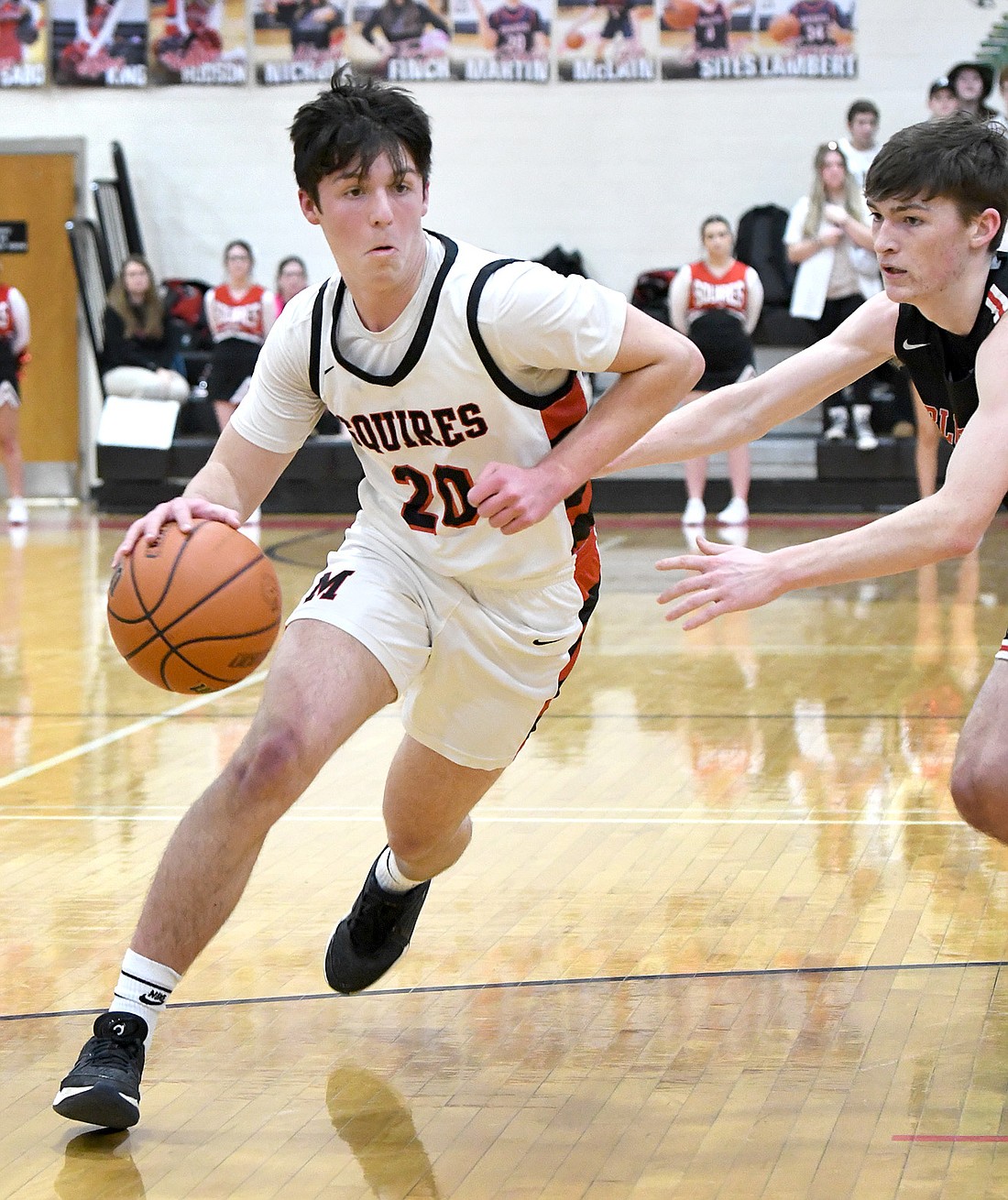 Manchester senior Gavin Martin drives to the basket during Tuesday night's home game against Bluffton. Photo by Gary Nieter