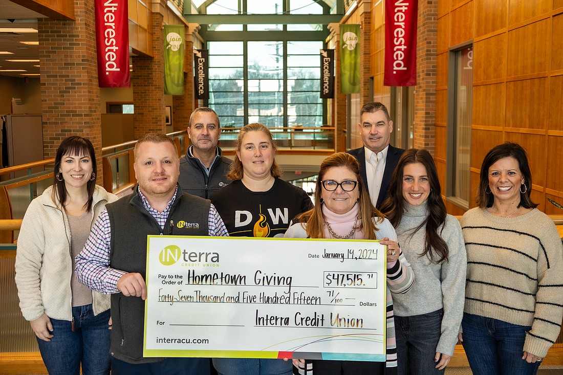 Members of Interra Credit Union’s Hometown Giving service project committee surround Amy Sink, chief executive officer, and Andy Marshall, chief operating officer. A record-breaking total of $47,515.71 was donated to nonprofit agencies throughout Interra’s communities. 

Photo Provided