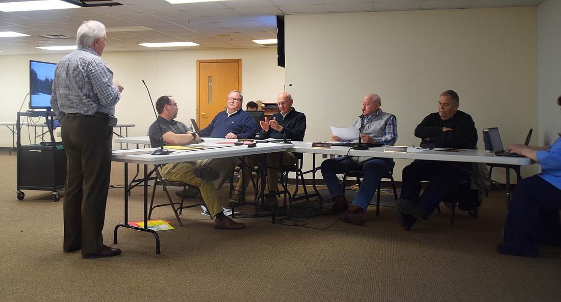 Pictured are attorney Steve Snyder (L) and Area Plan Director Matt Sandy (C) during the Board of Zoning Appeals meeting. In the back (L to R) are board members Kevin McSherry, Lee Harman, Randy Cox and Ron Robinson. Photo by Lauren Zeugner, InkFreeNews