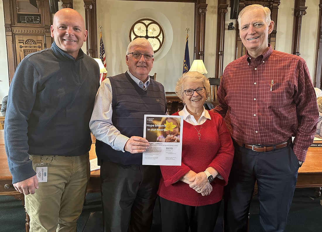 Carol Huffer made a presentation to the Kosciusko County Commissioners Tuesday about Daffodil Days and the American Cancer Society. Pictured (L to R) are Warsaw Mayor Jeff Grose, Commissioner Bob Conley, Huffer and Commissioner Brad Jackson. Photo by David Slone, Times-Union