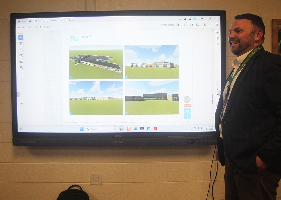 The Milford Elementary School project has officially entered its design phase. Wawasee Schools Superintendent Dr. Steve Troyer presents some of the exterior design renderings Tuesday, produced by Elevatus Architecture, to the board. Photo by Marissa Sweatland, InkFreeNews