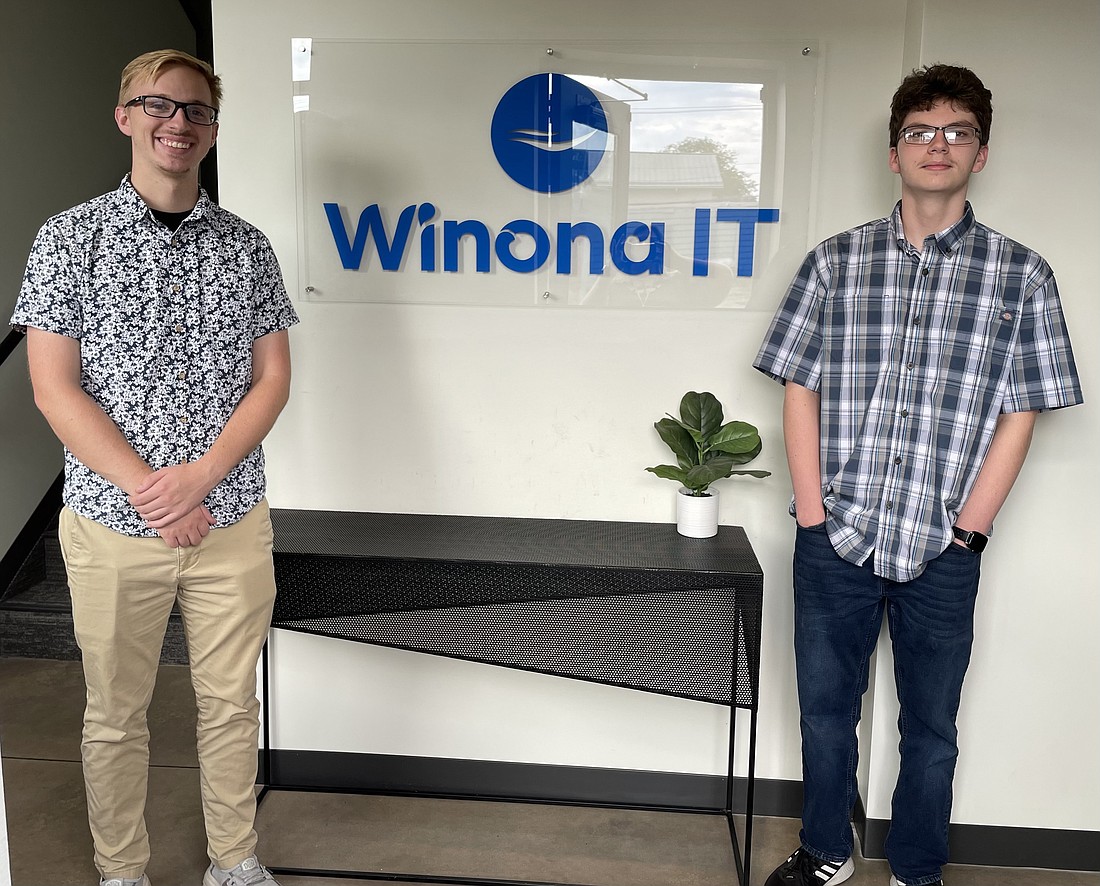 Pictured (L to R) are Eli Demopoulos, of Winona IT, with Josh Smith, WACC intern. Photo Provided.