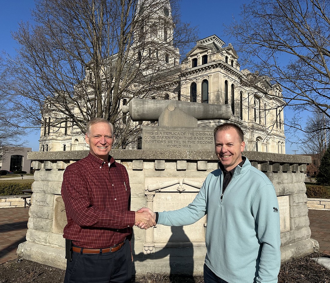 Northern District Kosciusko County Commissioner Brad Jackson (L) shakes the hand of Nate Scherer, who Jackson is endorsing as the next commissioner to represent the northern part of the county. Photo by David Slone, Times-Union