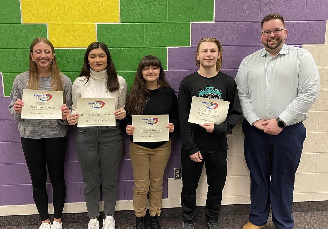 Four Tippecanoe Valley High School students were honored at the Tippecanoe Valley School Board's regular meeting on Monday as the Indiana Association of School Principals' Rising Stars of Indiana Class of 2025. Pictured (L to R) are honorees Mackaylie Costello, Marisol Gonzalez-Ramirez, Mercedes Herrera and Remington Rickel and TVHS Principal Brandon Kresca. Photo by Leah Sander, InkFreeNews
