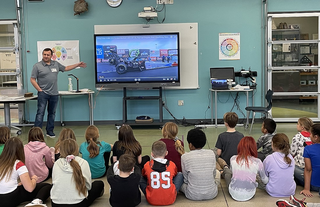 Kyle Wurtzel, a partner at Heartwood Planning Group and a private wealth financial advisor, visited Washington STEM Academy to not only share career readiness with students, but also to lead a STEM activity around motion with third-grade students. Photo Provided.