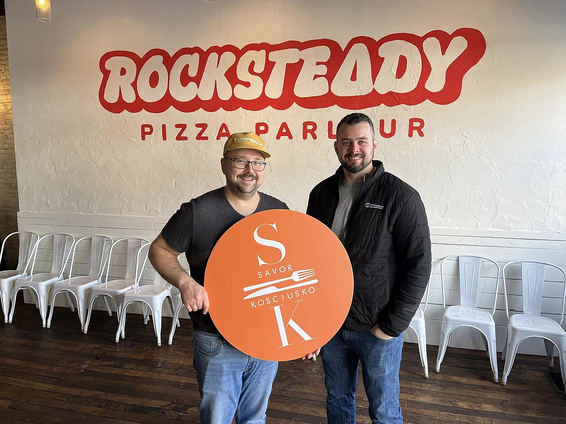 Savor Kosciusko starts Friday. Pictured (L to R) is Joel Squires, Rocksteady Pizza Parlour, and Josh Silveus, Kosciusko Chamber Board member. Photo by Lauren Klusman, Kosciusko Chamber of Commerce