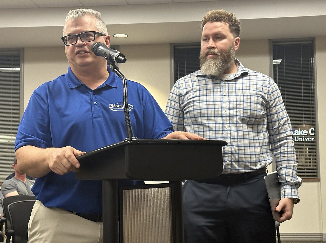 Main Street Warsaw Executive Director Rob Parker (L) and Warsaw City Planner Justin Taylor (R) answer questions from the Warsaw Common Council on Monday about the Designated Outdoor Refreshment Area ordinances. Photo by David Slone, Times-Union