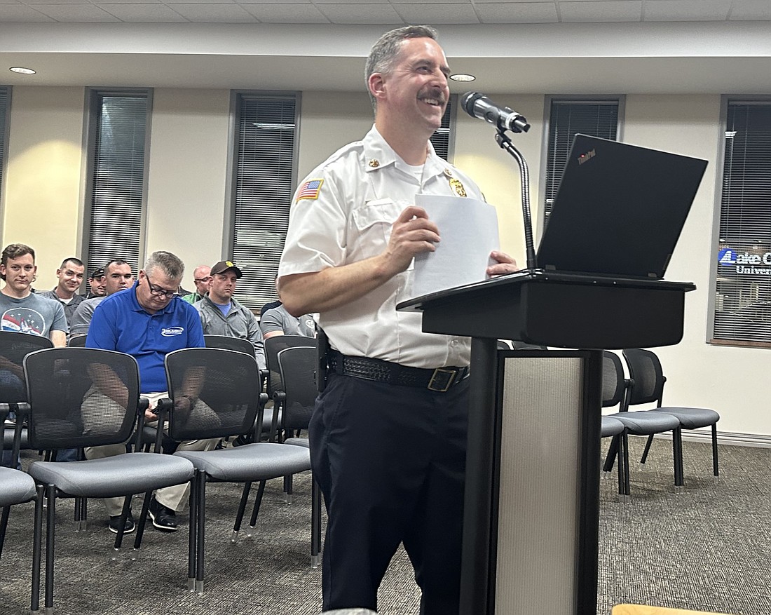 Warsaw-Wayne Fire Territory Chief Brian Mayo thanks the Warsaw Common Council for their OK on a resolution authorizing a petition to the state for the fire territory to seek an increase in its operating fund tax rate. Photo by David Slone, Times-Union