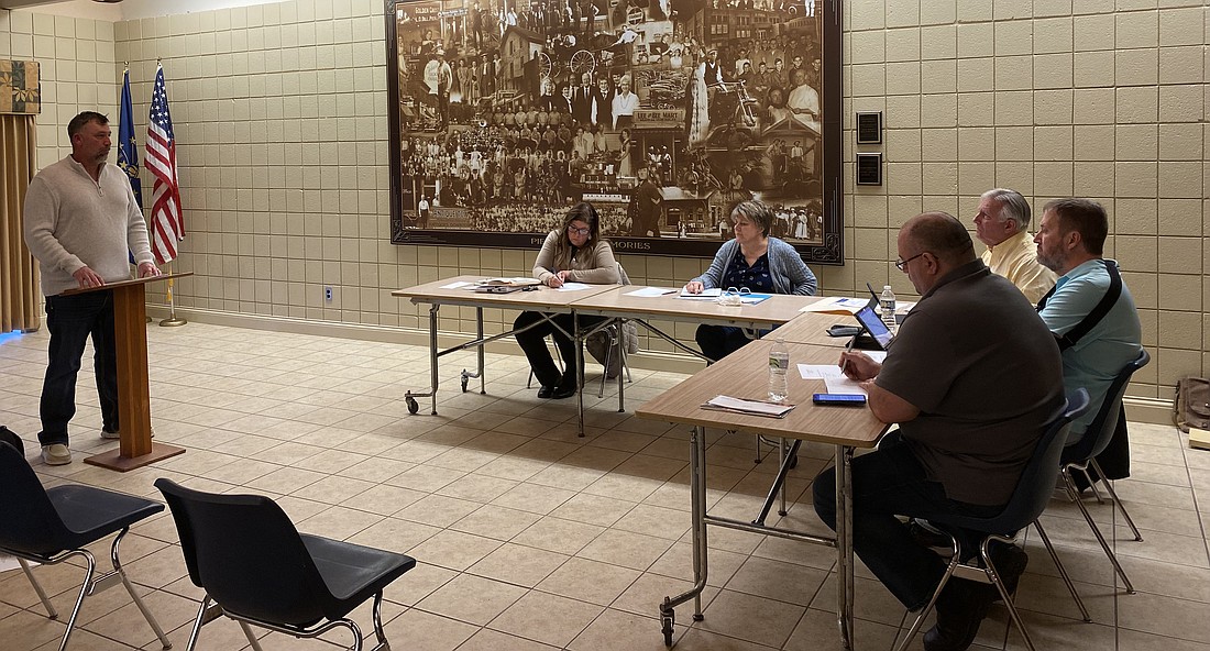 Chris Staley (far left), with the Pierceton Youth League, speaks at the Pierceton Town Council meeting on Monday at the Pierceton Community Building. Seated clockwise (L to R) are town attorney Tammy Keirn, Clerk-Treasurer Myra Mast, Council President Glenn Hall, Vice President Eric Trump and Council member Matt Brubaker. Photo by Leah Sander, InkFreeNews