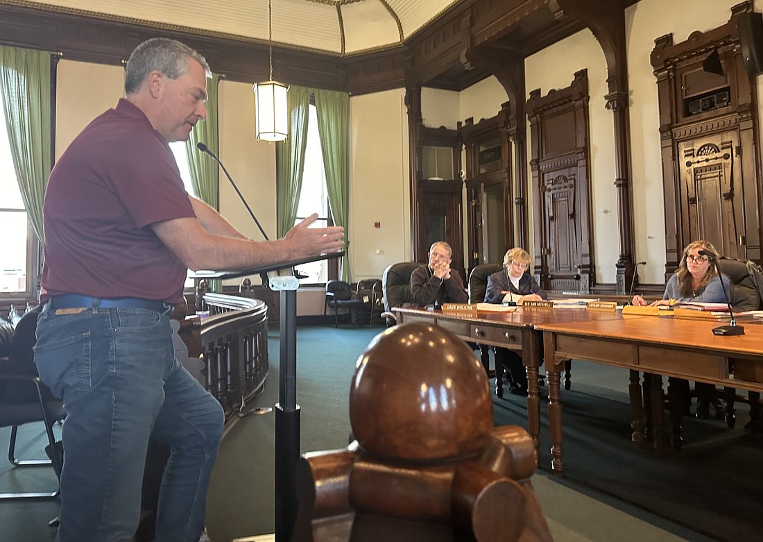 Jeremy Mullins, commercial manager for Louis Dreyfus Co., answers questions Thursday from members of the Kosciusko County Council. Photo by David Slone, Times-Union