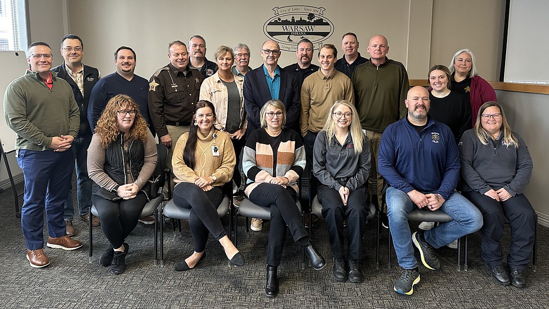 At Monday morning’s Kosciusko County CIT (Crisis Intervention Team) stakeholder group meeting, several community agencies signed a memorandum of understanding regarding the goals and protocols to better the county’s crisis response system. Pictured are representatives of the different agencies. Photo by David Slone, Times-Union