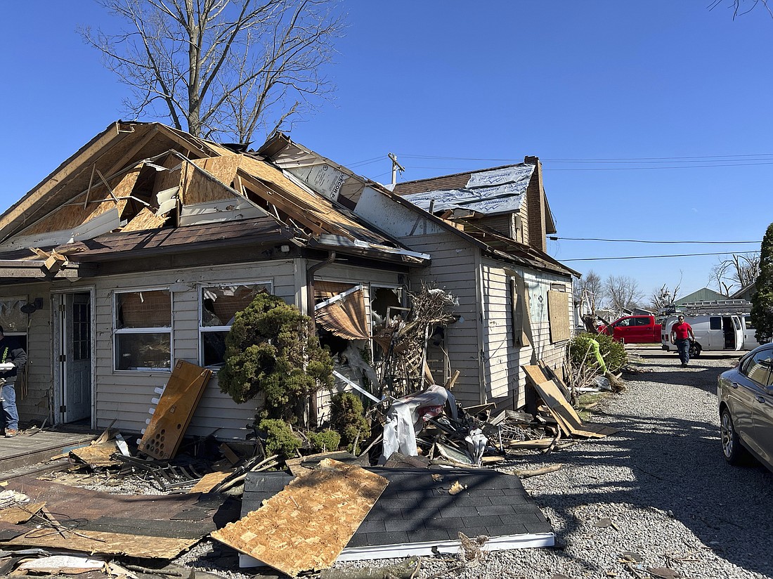 Joe Baker's damaged home in Valleyview, Ohio, on Saturday, March 16, 2024. Thursday night’s storms left trails of destruction across parts of Ohio, Kentucky, Indiana and Arkansas.  (AP Photo/Patrick Orsagos)