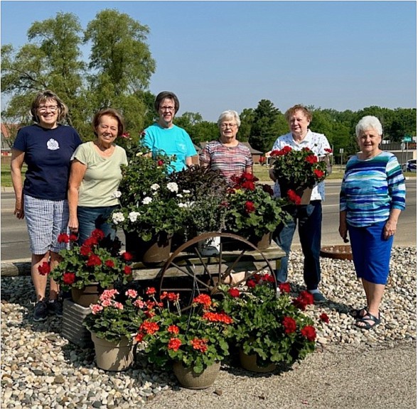 Pictured are sisters Kathy Stanley, Barb VanCuren, Jean Whitenack, Marcia Randolph, Maria McGrath and Brenda Arnold with patio geraniums from Delta Theta Tau’s 2023 fundraiser. Photo Provided.