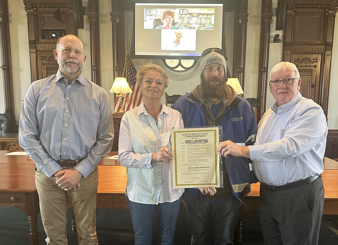 Kosciusko County Commissioners proclaimed May to be Motorcycle Safety and Awareness Month at their meeting Tuesday. Pictured (L to R) are Commissioner Cary Groninger; Rhonda Hardy and B.J. Summers, American Bikers Aimed Toward Education (ABATE); and Commissioner Bob Conley. Photo by David Slone, Times-Union