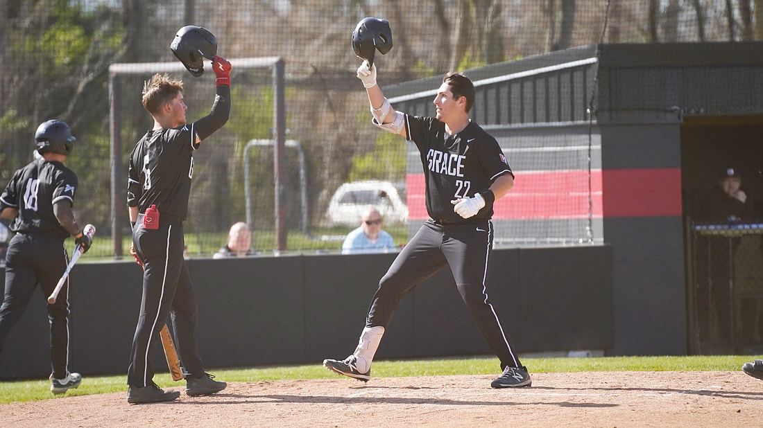 Pictured is Cayden Calloway (left) celebrating Grant Hartley's (right) home run during Grace's win over Goshen on Tuesday. Photo by Grant Cook