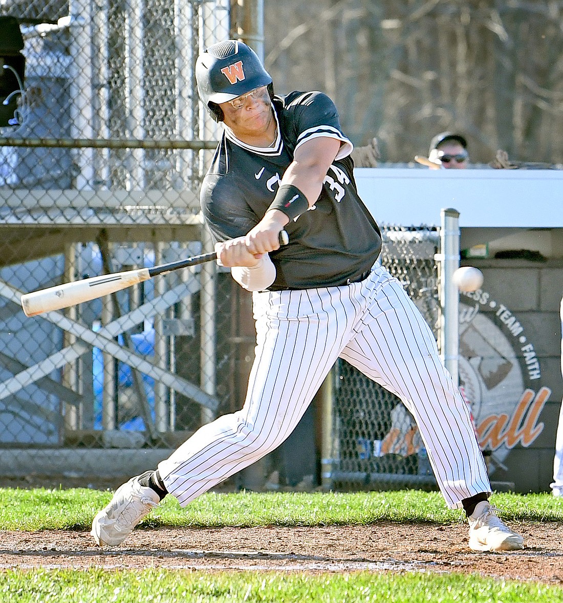 Junior Hunter Dippon drives in two runs for Warsaw in the third inning during Monday evening's home game against Wawasee...NIeter