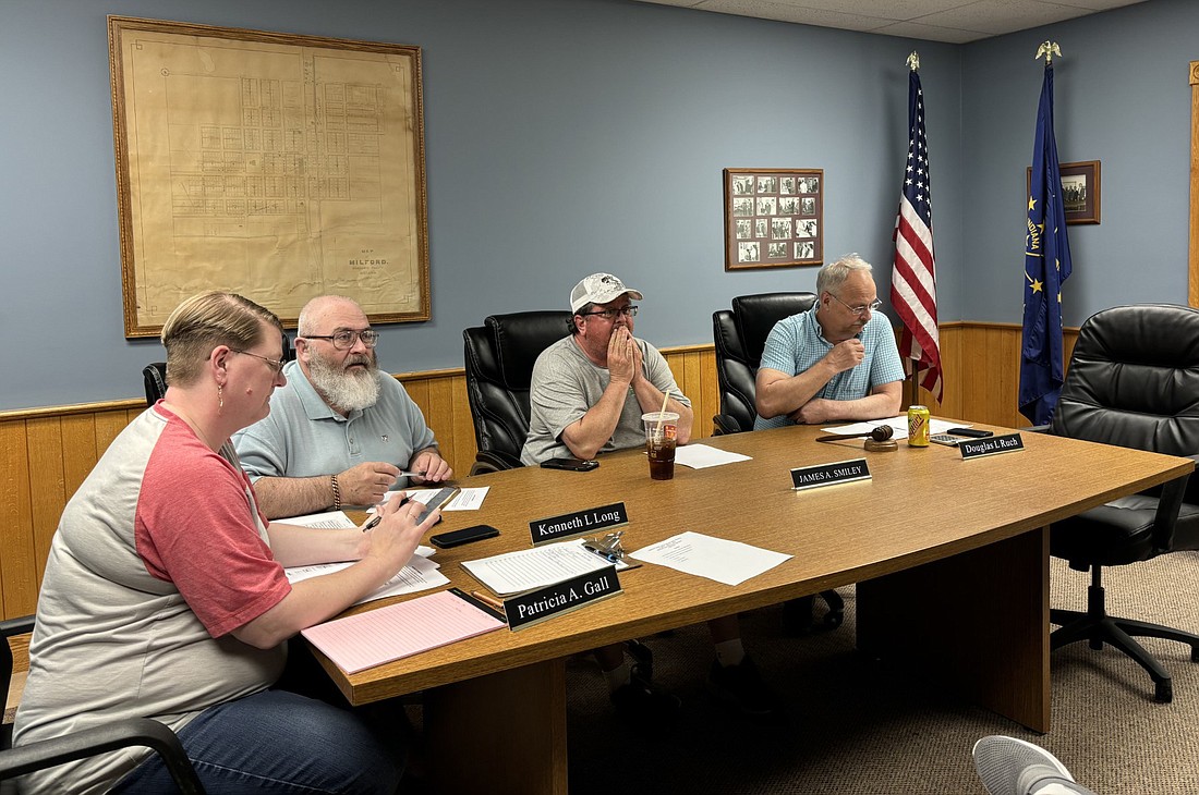 Milford Council members met in special session Monday regarding the purchase of a new fire engine. Pictured (L to R) are Clerk-Treasurer Tricia Gall, Councilman Kenneth Long, Councilman James Smiley and Council President Doug Ruch. Photo by Denise Fedorow