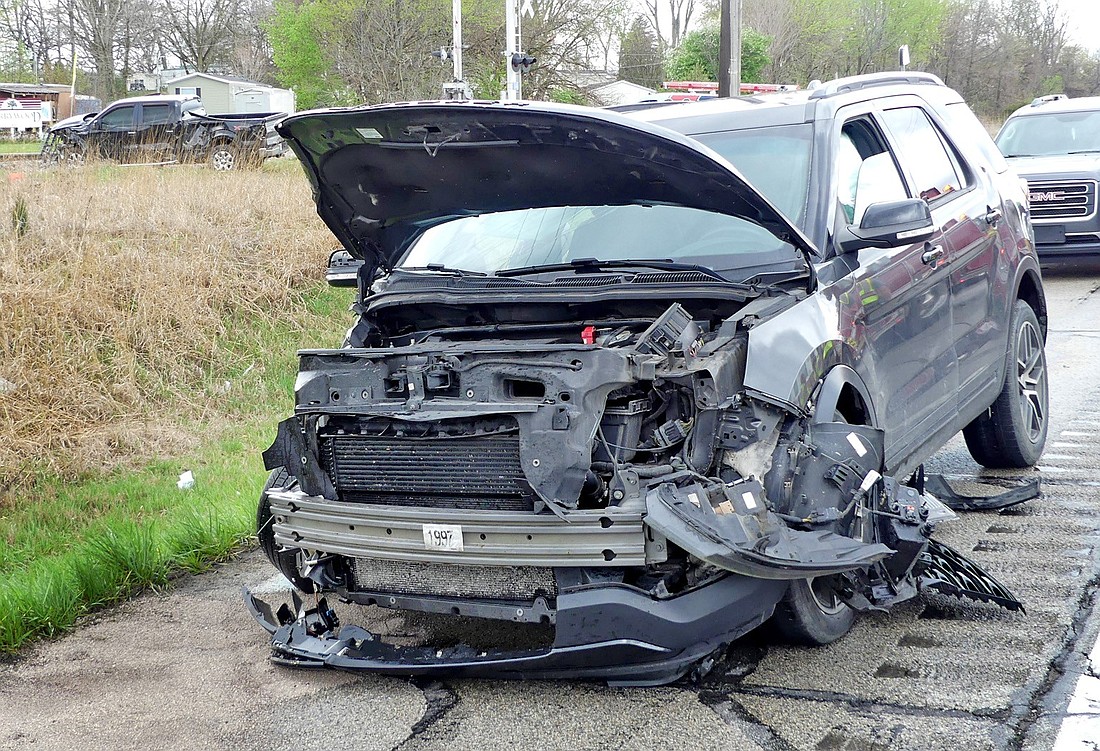 One of the vehicles sits off the eastbound lane of U.S. 30 while the other came to rest south of U.S. 30 on CR 325E. Photo by Gary Nieter, Times-Union