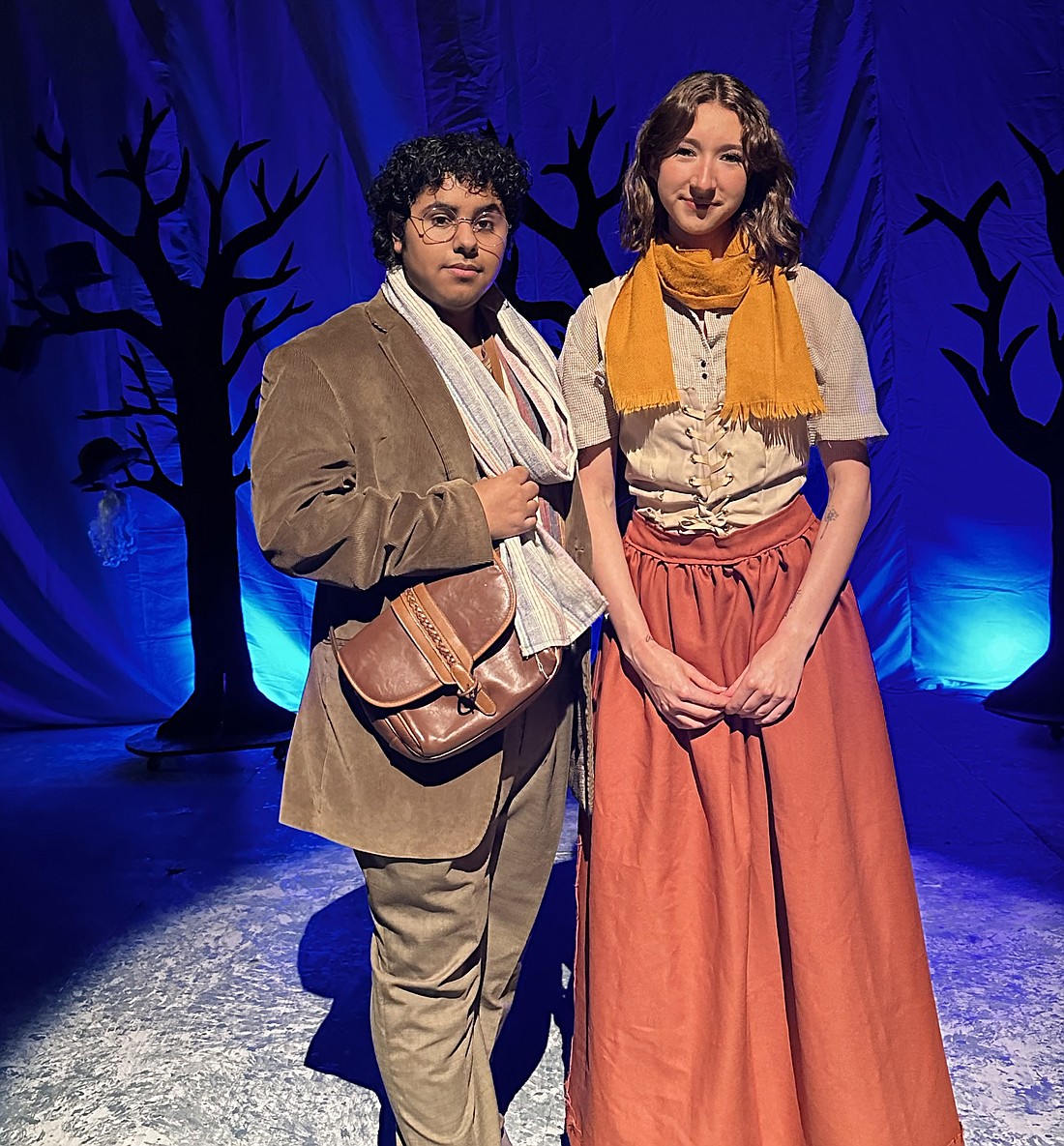 Pictured (L to R) are Joel Montoya as the baker and Lily House as the baker’s wife in Warsaw Community High School’s production of “Into the Woods.” Photo Provided