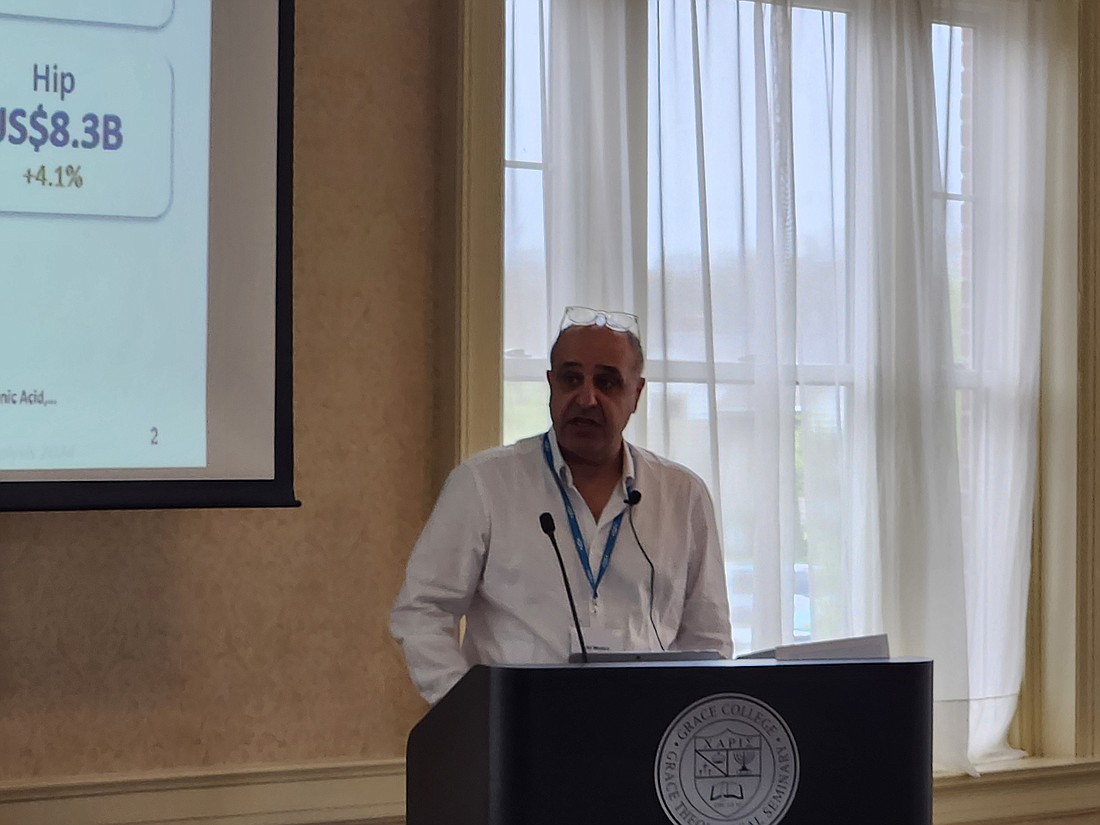 Avicenne Medical founder Ali Madani speaks at the keynote speaker for the “Efficient Manufacturing of Orthopedic Implants” event. Photo by Patrick Webb, InkFreeNews