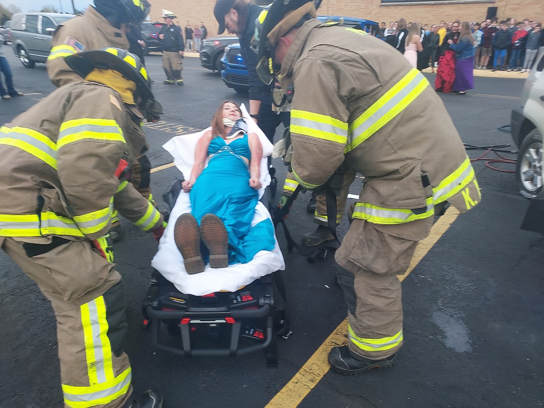 Whitko Jr./Sr. High School student Chloe Clark is transported on a stretcher during a mock accident Tuesday. Photo by Jackie Gorski, Times-Union