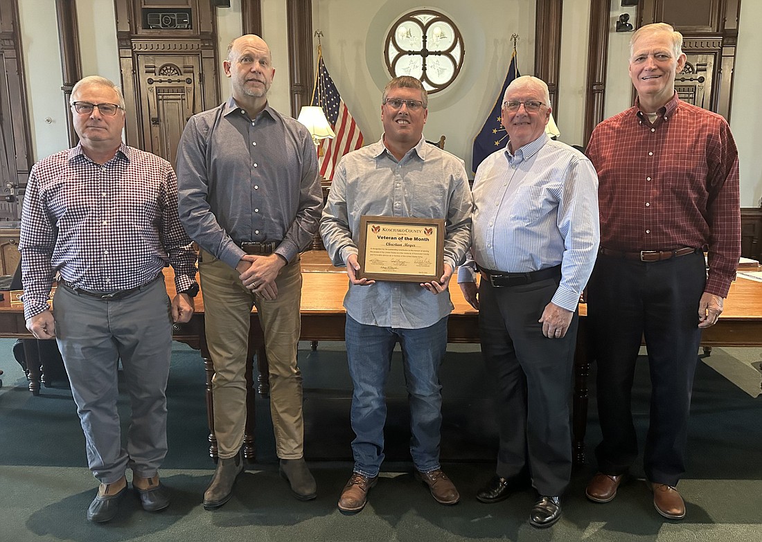 Christian Moyer is the April 2024 Kosciusko County Veteran of the Month. Pictured (L to R) are Kosciusko County Veteran Service Officer Darryl McDowell, Commissioner Cary Groninger, Moyer and Commissioners Bob Conley and Brad Jackson. Photo by David Slone, Times-Union