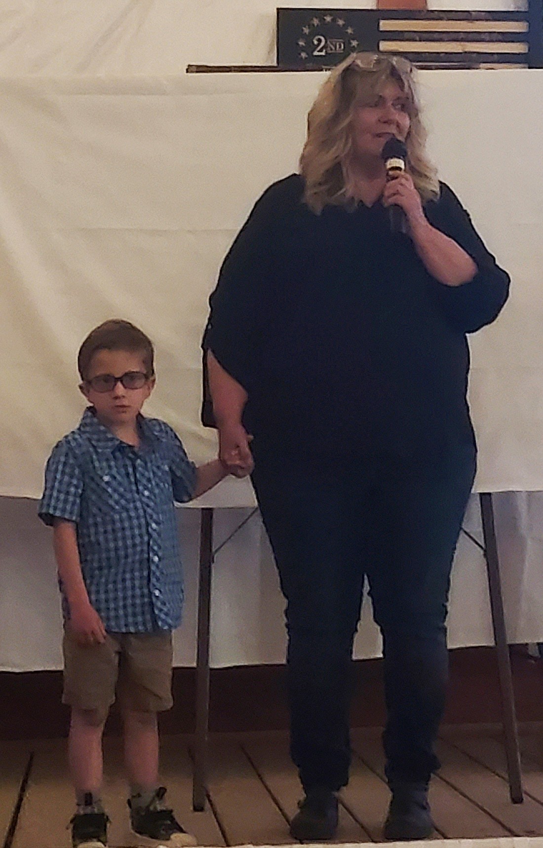 Tammy Stackhouse, founder of The Magical Meadows (R), talks at the nonprofit’s annual Rise Up event Saturday with Owen Siebeneck by her side. Photo by Jackie Gorski, Times-Union