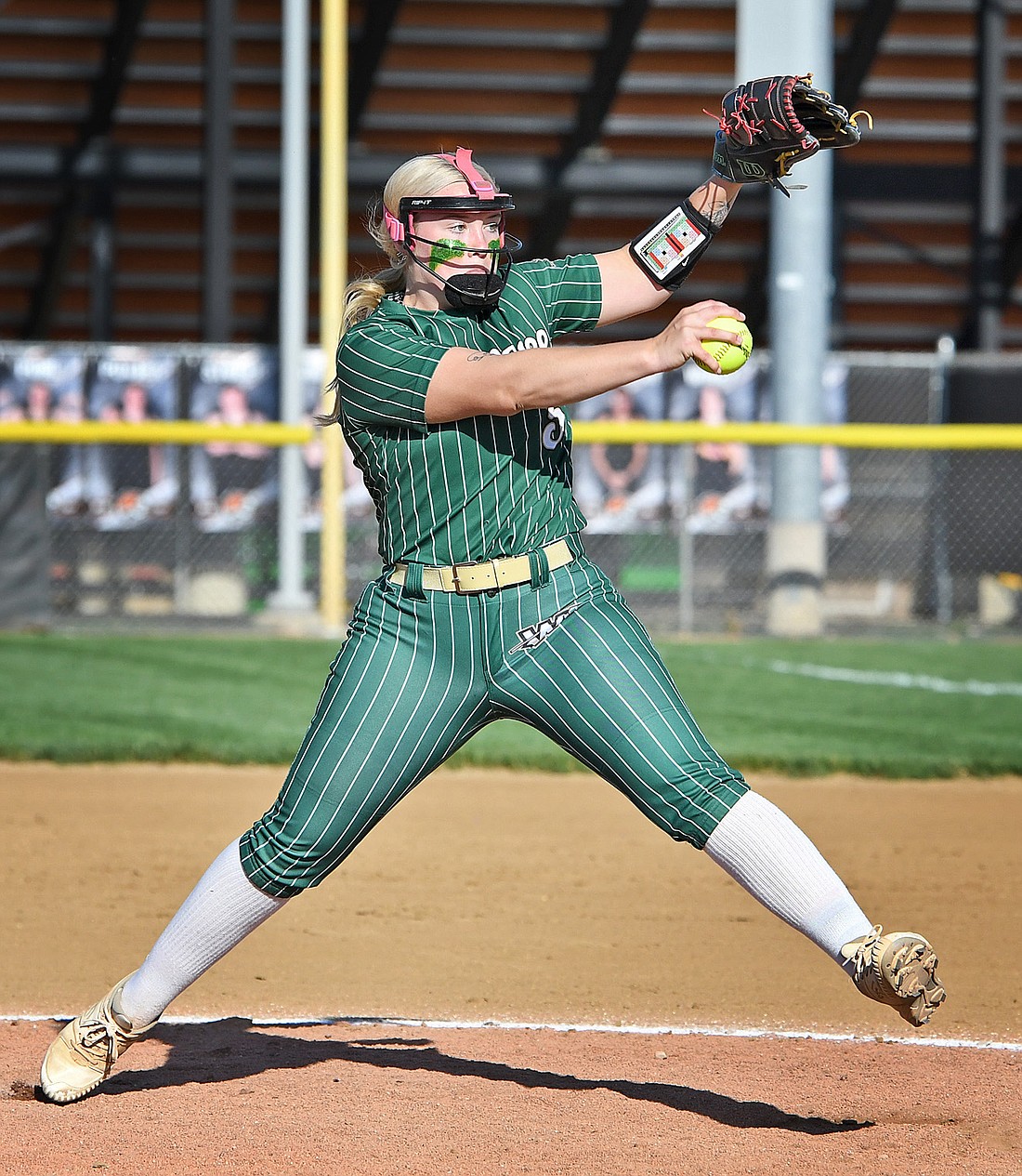 Wawasee senior pitcher Haylee Allen takes a big wind up while delivering the ball to the plate...Nieter