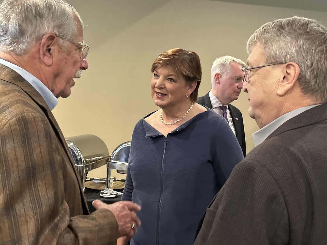 Indiana Republican Party Chairwoman Anne Hathaway (C) and Kosciusko County Republican Central Committee Chair Mike Ragan (R) speak with Art Gakstatter (L) at the Kosciusko County Republican Party Lincoln Day Dinner Thursday at The Owl’s Nest in North Webster. Photo by David Slone, Times-Union