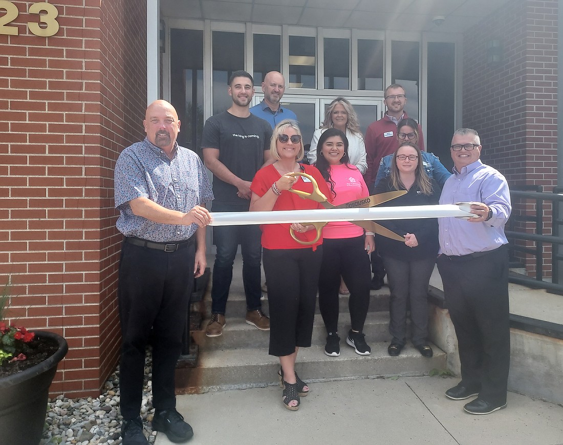 The Kosciusko Chamber of Commerce held a ribbon-cutting for Northern Lakes Gospel Promotion Monday. Pictured are Scott Wiley, Chamber member relations manager; Wende Roberts, Northern Lakes Gospel Promotions and Morning Star; Rob Parker, Chamber president and CEO; Jessica Marroquin, Joy Cleaning and Home Services, Chamber ambassador; Heather Lardino, 1st Source Bank, Chamber ambassador; Joe Jackson, Northern Lakes Gospel Promotion; Bob Jackson, Northern Lakes Gospel Promotion; Stacey Leek, Stillwater Hospice, Chamber ambassador; Corbin Holtsberry, Lake City Bank, Chamber ambassador; and Melissa Paxton, The Waters of Syracuse, Chamber ambassador. Photo by Jackie Gorski, Times-Union