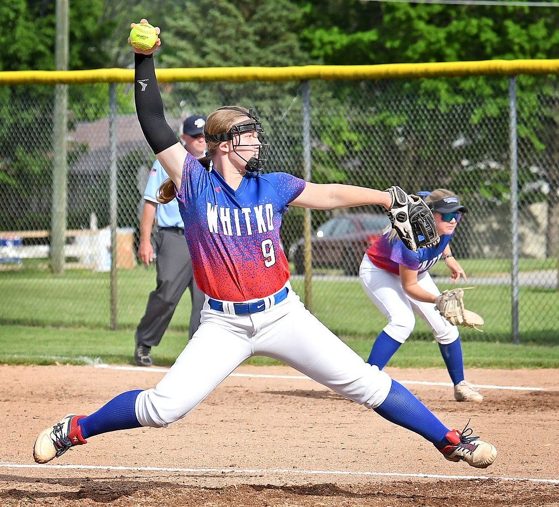 Taking flight during her windup, junior Cassidy Skinner of Whitko prepares to deliver a pitch during Wednesday evening's home game against Wabash...Nieter