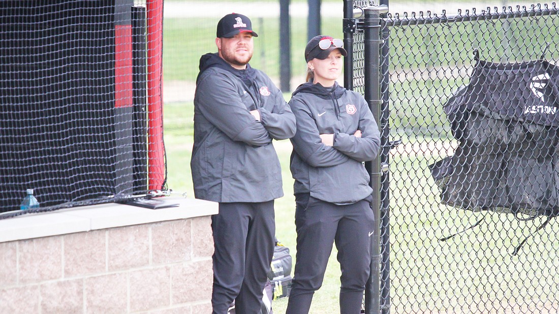 Pictured are Bo and Sam Coolen while coaching Grace's softball team