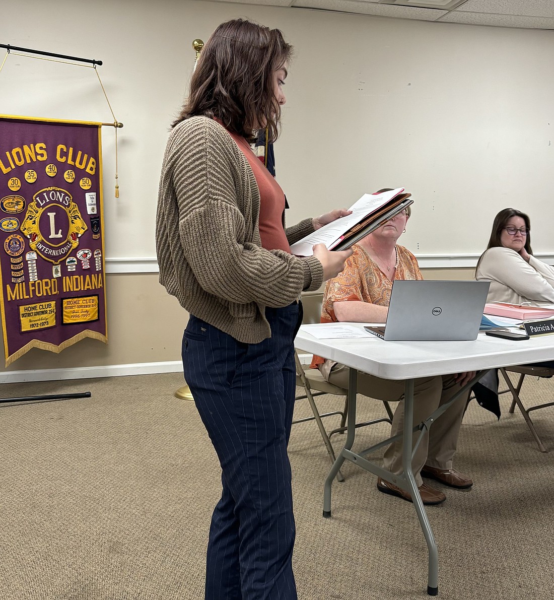 Olivia Nix, of Michiana Area Council of Governments, gave a report at the Milford Town Council meeting. Clerk-Treasurer Tricia Gall and Deputy Clerk Renda Loetz also are shown. Photo by Denise Fedorow.