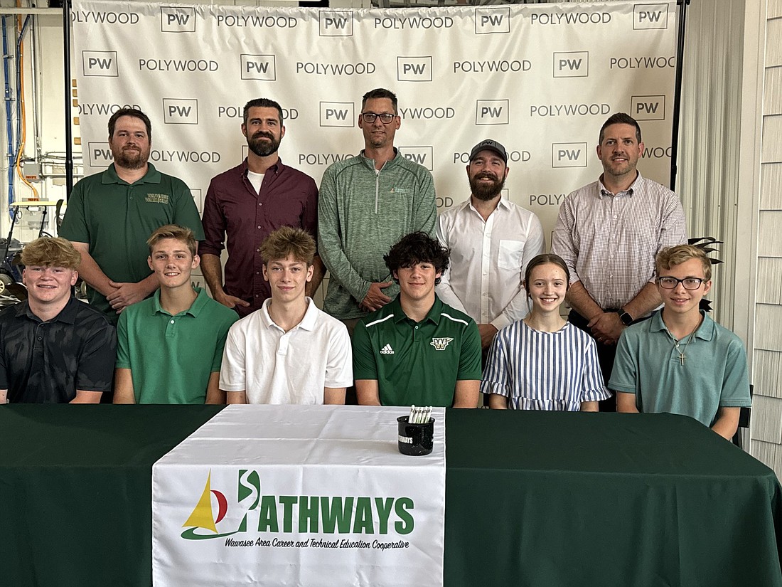 Polywood hosted an open house Tuesday for students and parents of Polywood Academy to mingle, meet instructors and learn more about the program. Pictured (L to R) are, front row: Austin Harney, Micah Wilson, Andrew Waugh, Kassidy Carter, Nicholas Moreland; back row: Jeremy McKinzie, Landon Deel, Jon Everingham, Daniel Fattorusso and Ryan Zimmerman. Photo by Marissa Sweatland, InkFreeNews