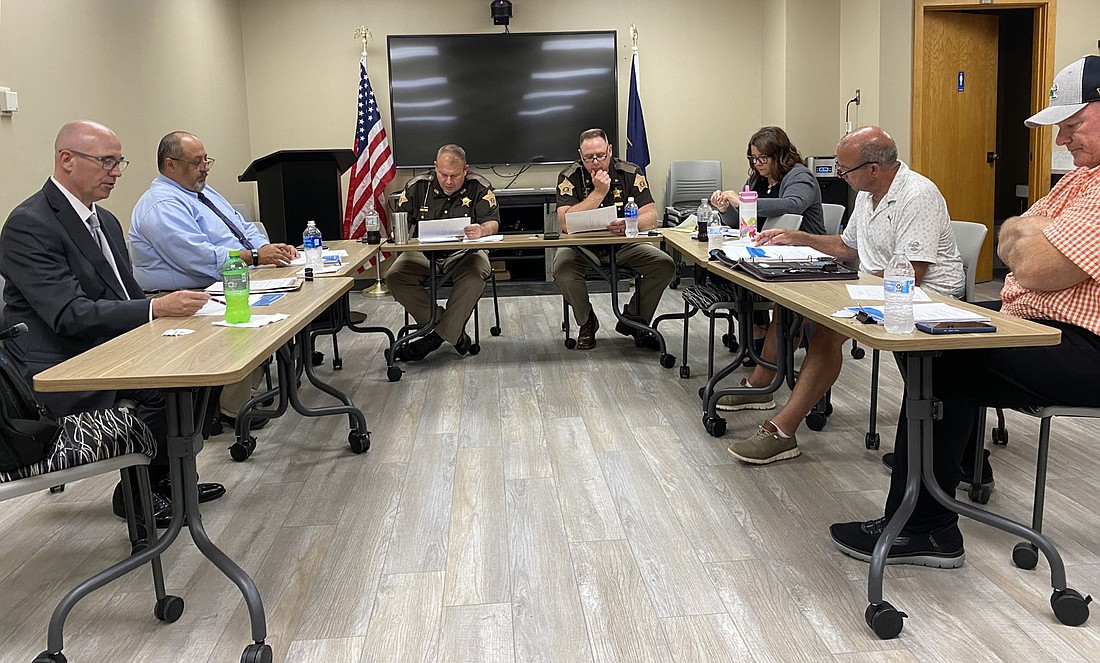 At the Kosciusko County Sheriff's Merit Board meeting on Thursday are (L to R) Board members Alan Alderfer and Tony Garza, Kosciusko County Sheriff's Office Chief Deputy Chris McKeand, Sheriff Jim Smith and Board President Dana Leon and members Matt Heiman and Bill Kelly. Photo by Leah Sander, InkFreeNews