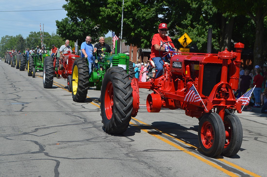 Echoes of the Past takes part in the 2022 Egg Festival Parade. Photo by David Slone, Times-Union