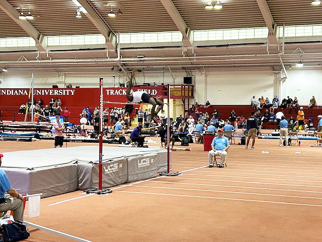 Warsaw sophomore Jordan Randall clears the bar with ease on his way to a third place finish in the high jump event at the IHSAA Boys Track and Field State Finals in Bloomington Saturday.