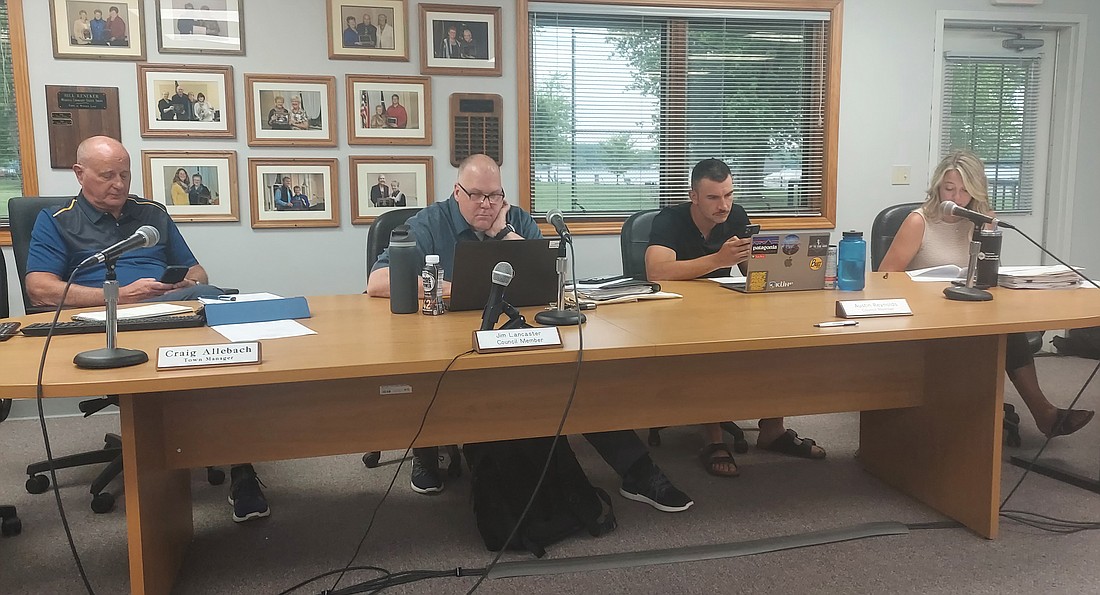 Pictured (L to R) are Winona Lake Town Manager Craig Allebach and Council members Jim Lancaster, Austin Reynolds and Ashley McGinnis. Photo by Jackie Gorski, Times-Union