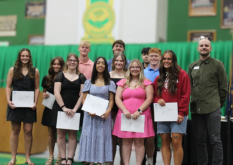 Pictured are Kosciusko Community Foundation Scholarships recipients Jorge De La Rosa, Riley Shepherd, Macy Pettersen, Colette Blackburn, Devin Boggs, Nathan Parker, Macy Petersen, Erika Hendersen, Riley Shepherd, Caroline Stump, Valeria Garcia, Wade Jones and Erin VanMeter with presenter Alex Hall. Photo Provided.