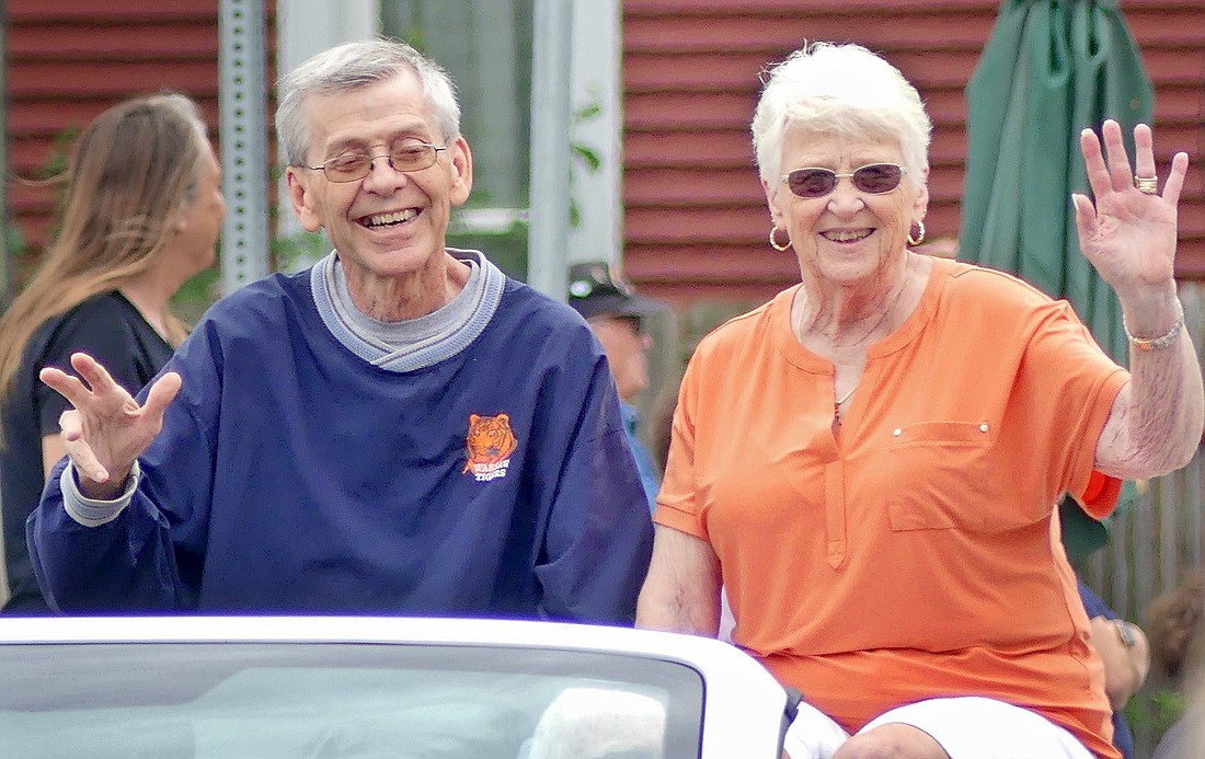 Parade marshals Marlin Carr and Jean Weller lead the pack during Saturday's Silver Lake parade. Photo by Gary Nieter, Times-Union