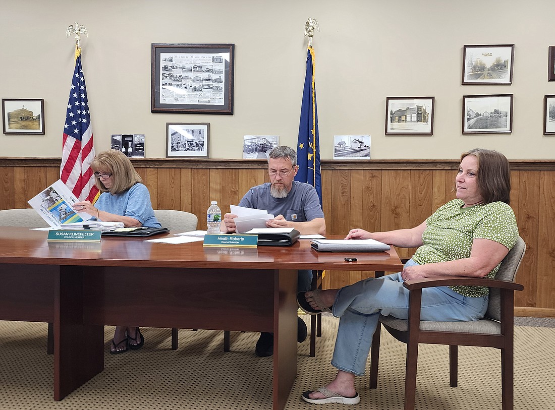 Etna Green Town Councilwoman Susan Klinefelter (L) and Town Council President Health Roberts go through some of the documents for Tuesday night’s meeting, while Clerk-Treasurer Patti Cook waits for the meeting to begin. Photo by Deb Patterson, InkFreeNews