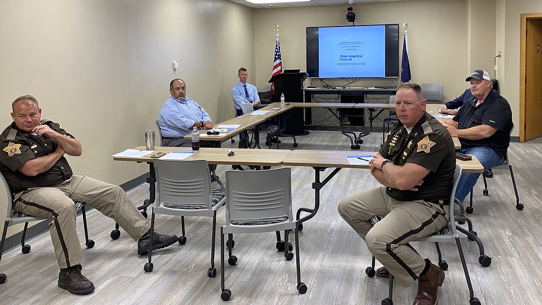 At the Kosciusko County Sheriff's Merit Board meeting on Thursday are (L to R) Kosciusko County Sheriff's Office Chief Deputy Chris McKeand, Board member Tony Garza and Kosciusko County Sheriff Jim Smith. Photo by Leah Sander, InkFreeNews