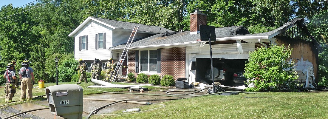 Firefighters responded to a house fire Saturday morning at Cherry Creek in Warsaw. Photo by Gary Nieter, Times-Union