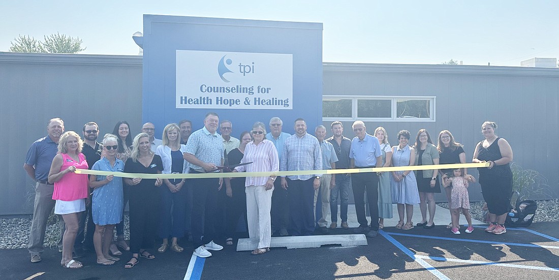 Turning Point Inc. had a ribbon-cutting ceremony Monday morning with the North Webster-Tippecanoe Township Chamber of Commerce for their new location at the corner of Washington and Blaine streets in North Webster. Their official opening date is planned for July 8. Photo by David Slone, Times-Union